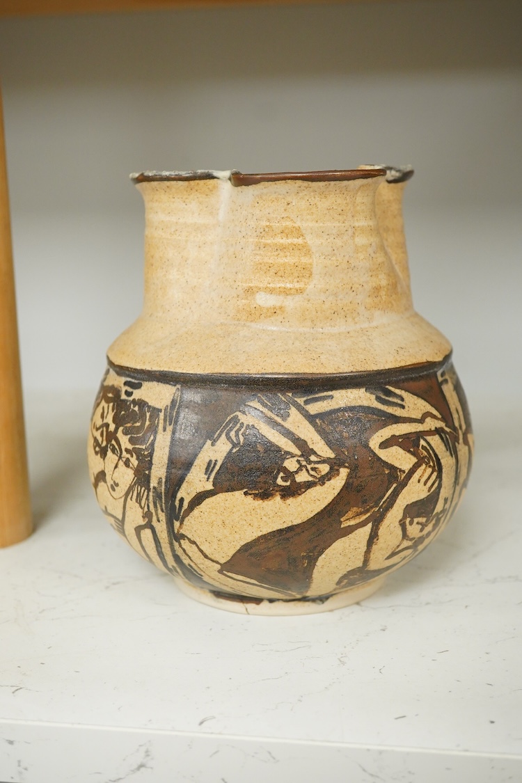 Yolande Beer (Sussex, contemporary), two Studio pottery vessels to include a vase in the form of a basket decorated with fish, largest